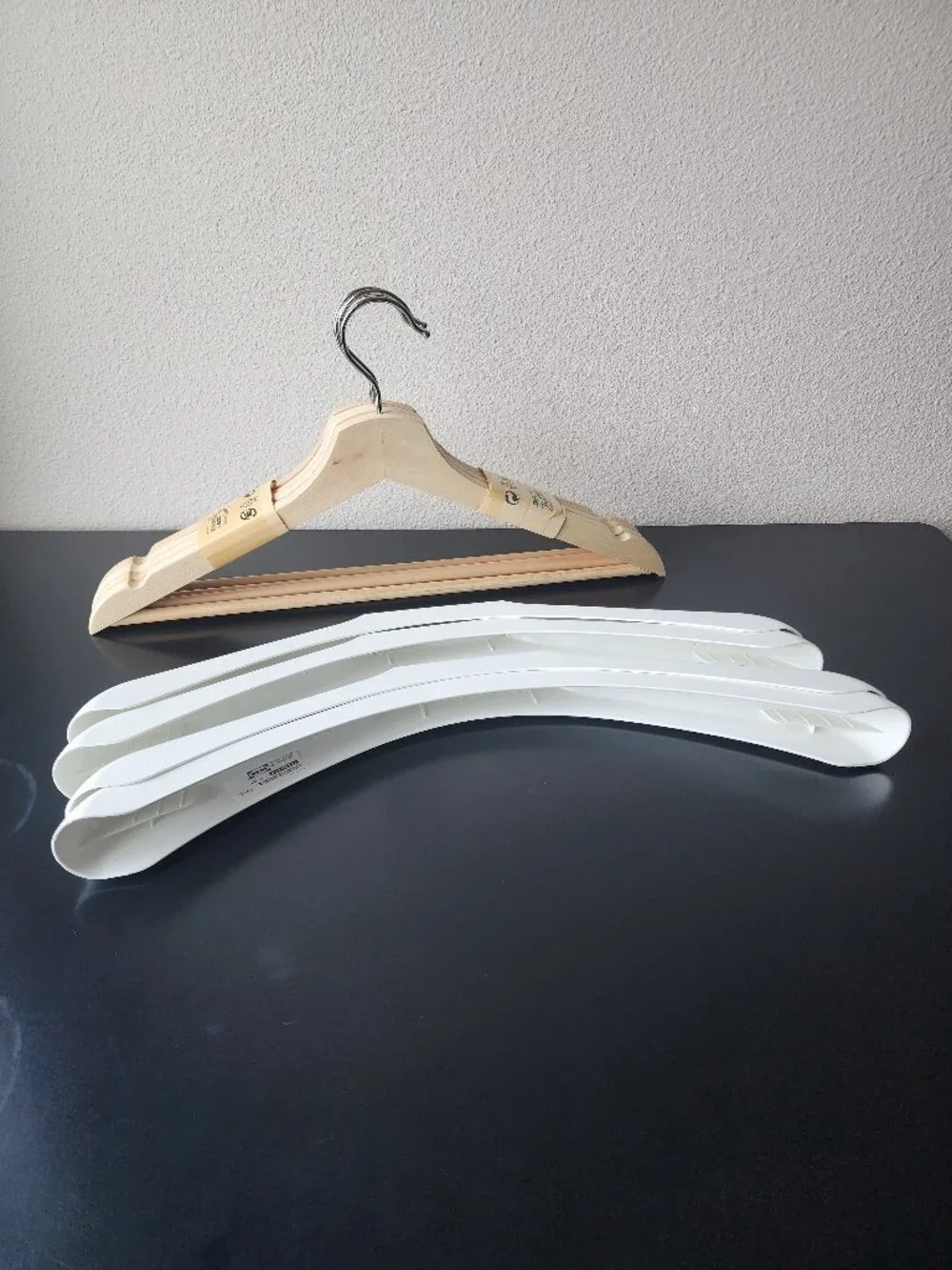 Bundle of 4 IKEA BUMERANG Hangers in natural wood + 4 Shoulder shapers in white